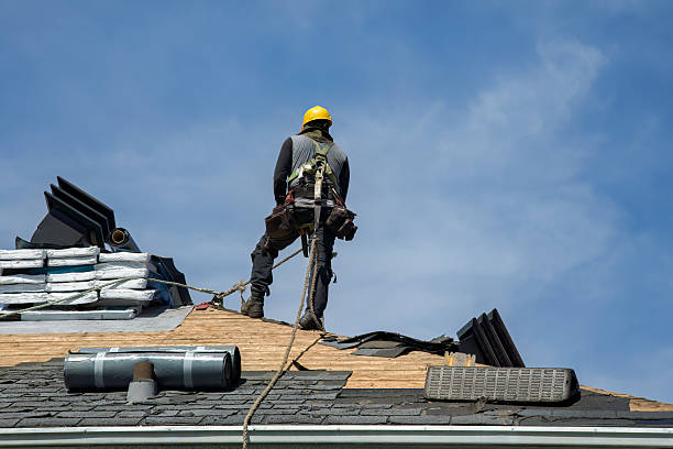 Professional Gutter Installation technician working in Springville, IA